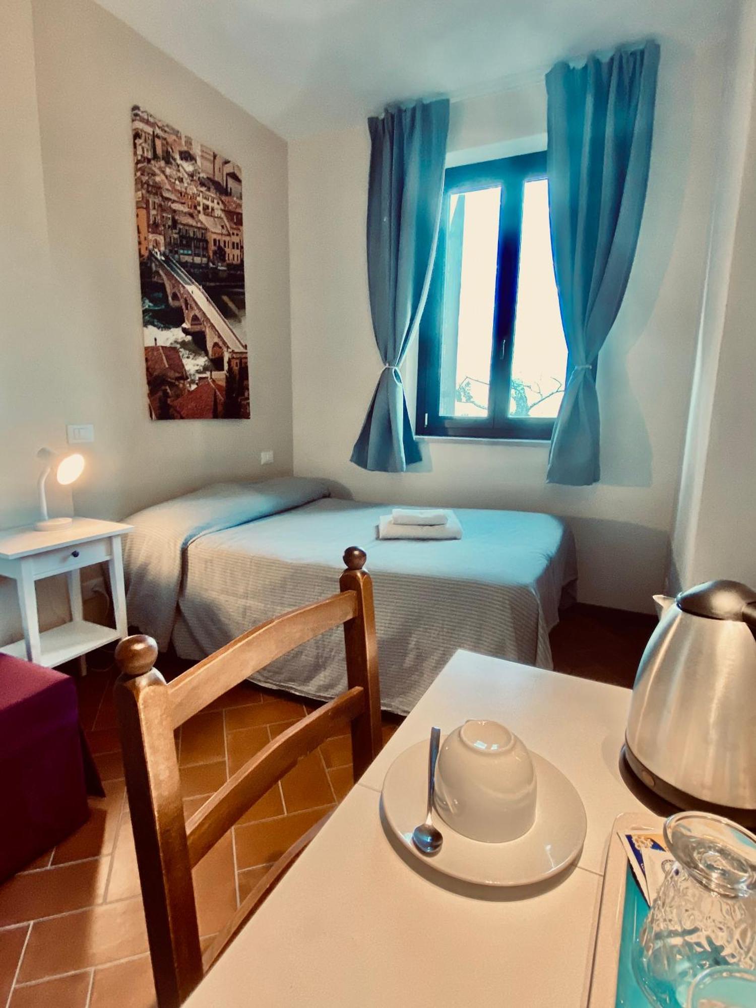 Apartamento Residenza Cipressi E Olivi Verona Habitación foto