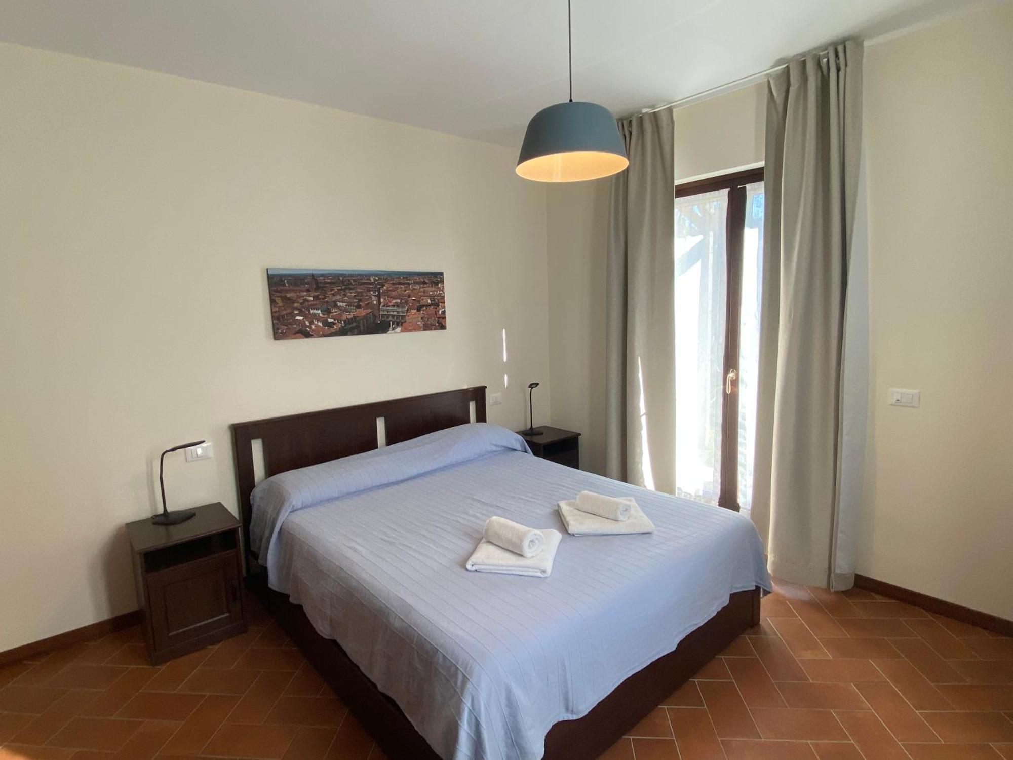 Apartamento Residenza Cipressi E Olivi Verona Exterior foto